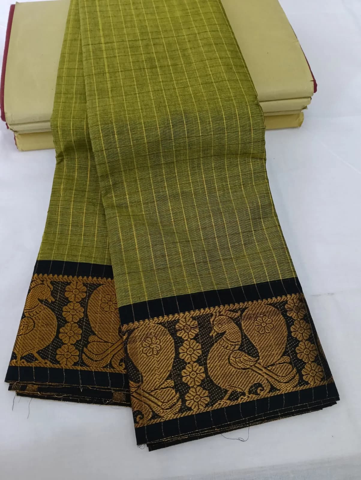 Parrot green checked sungudi saree